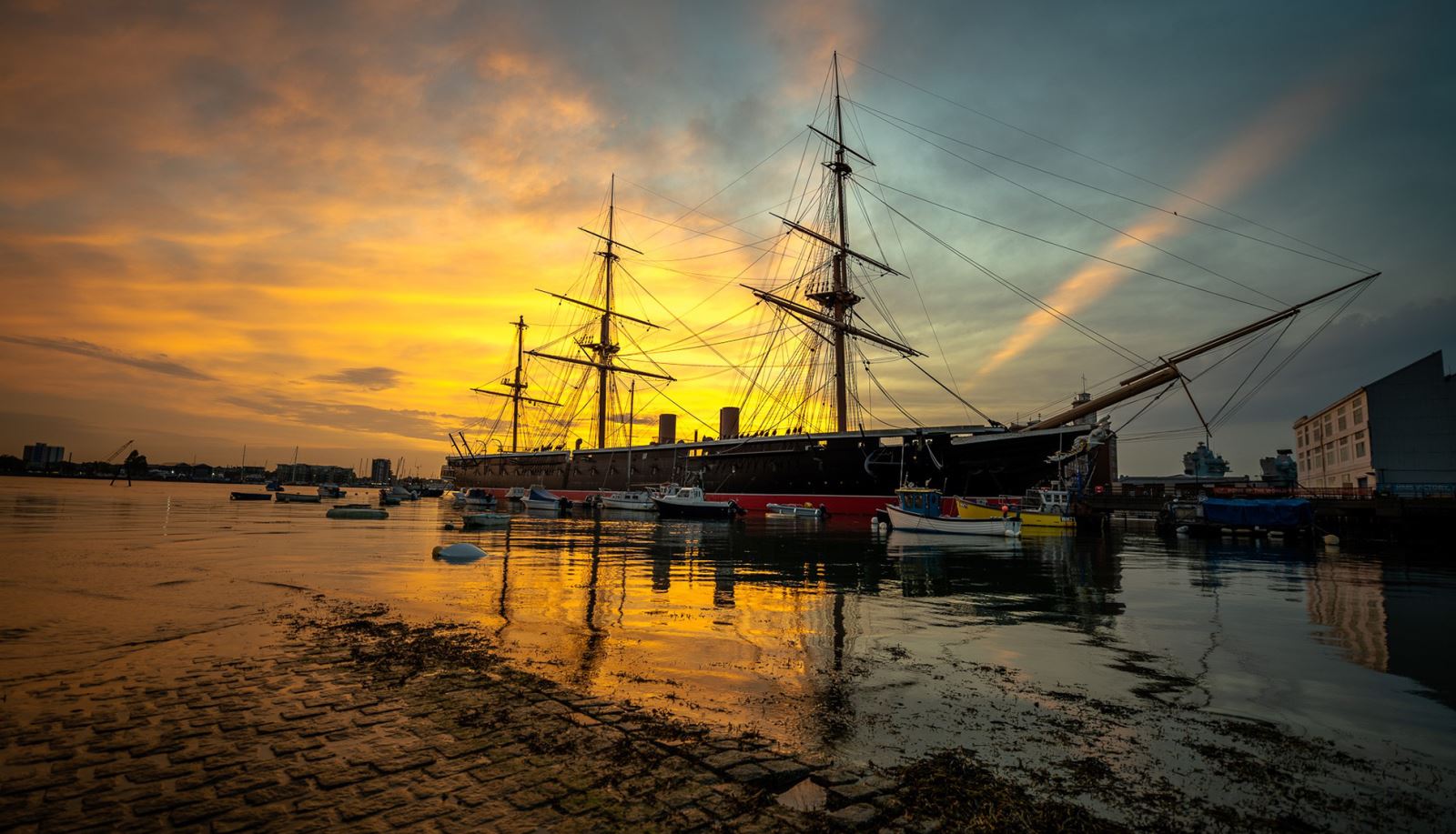 Sunset behind HMS Warrior at Portsmouth Historic Dockyard